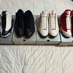 Lots of 4 Air Jordan 13. Blue, Purple, Yellow and Maroon. $820.